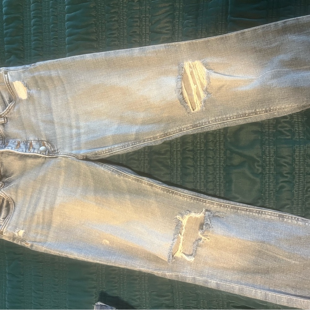 Distressed Light Blue Jeans